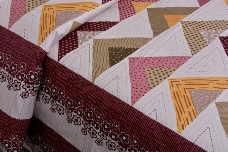 Rosee Triangle Shape Maroon Color Double Bed sheet Closeup