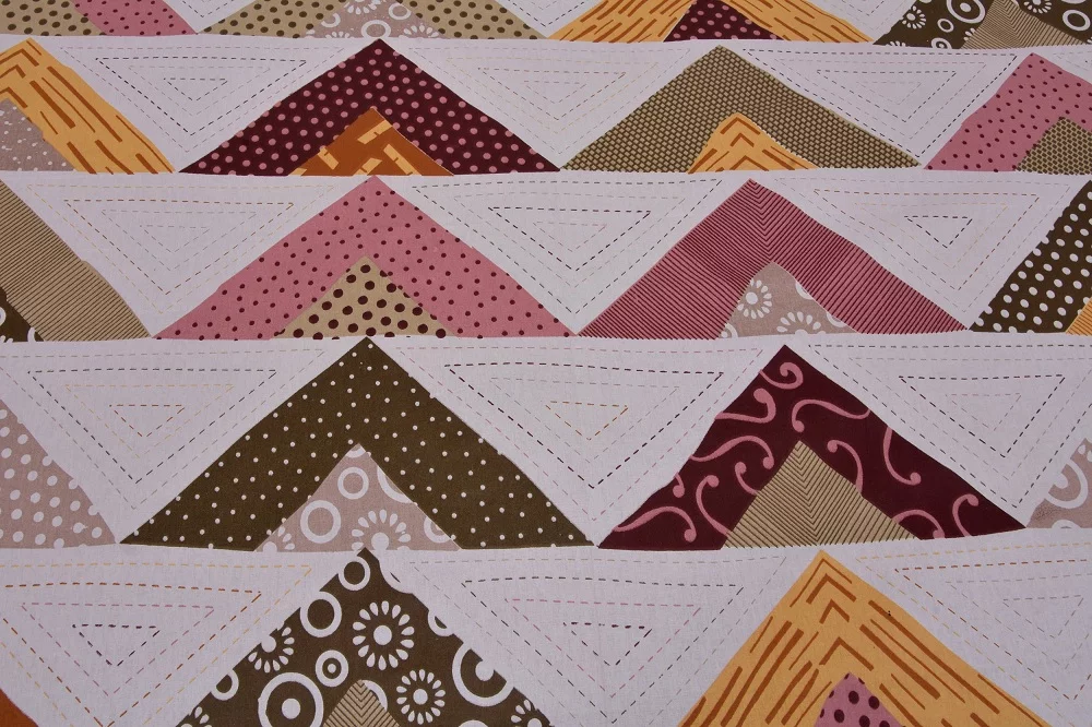 Rosee Triangle Shape Maroon Color Double Bed sheet Design